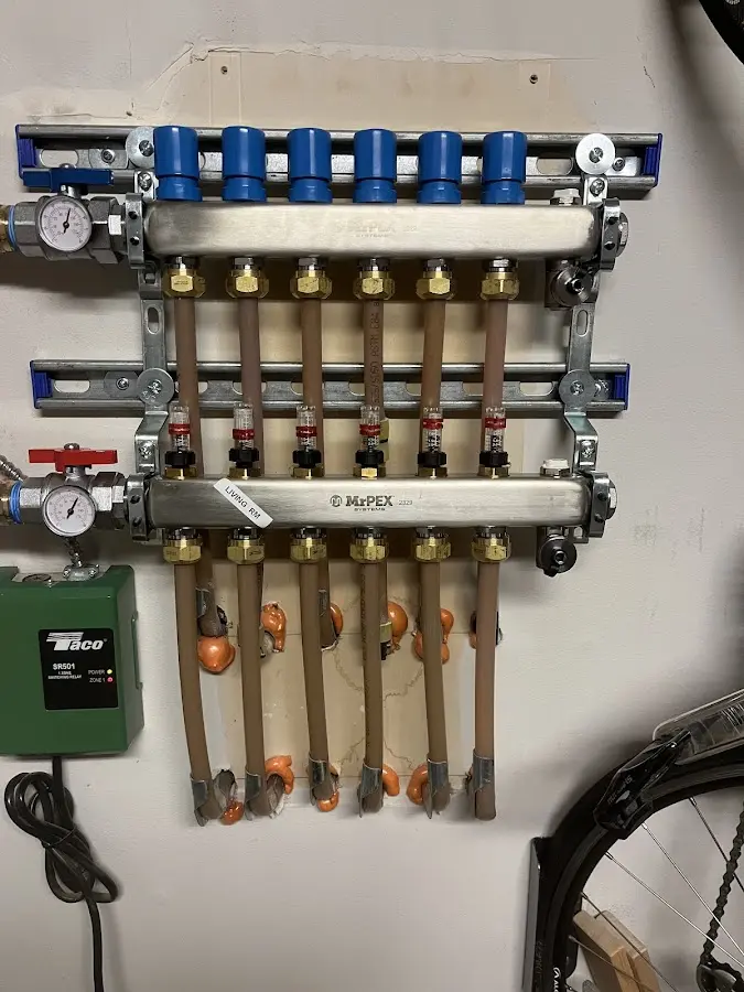 Plumber performing Water Heater Repair at a residential property in Middletown